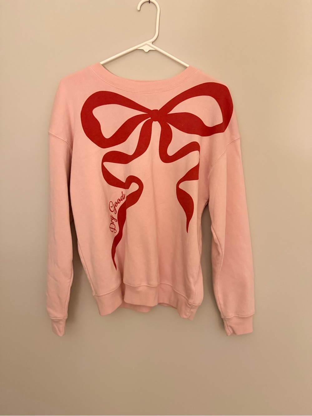 Dry Goods Pink Sweatshirt with Large Red Bow Graphic